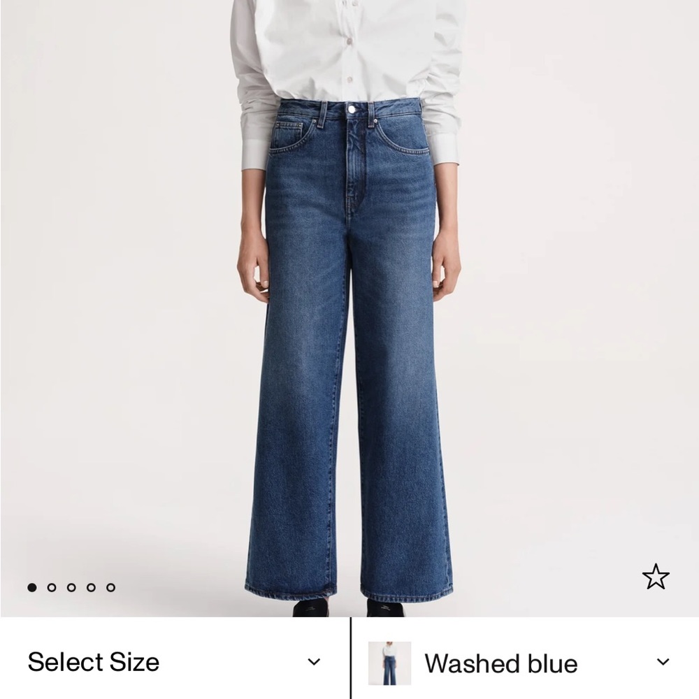 Toteme flare fit denim in washed blue 27 by 30